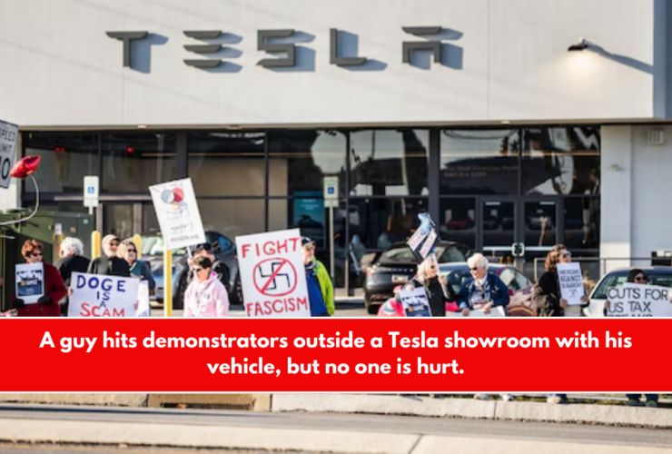 A guy hits demonstrators outside a Tesla showroom with his vehicle, but no one is hurt.