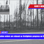 Evacuation orders are relaxed as firefighters progress on flames